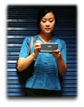 Woman using a mobile device for a routine task