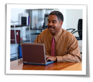 Man using a laptop to access eLearning