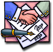 Hands shaking over signed agreement