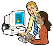 Manager explaining a point to a trainee at computer terminal